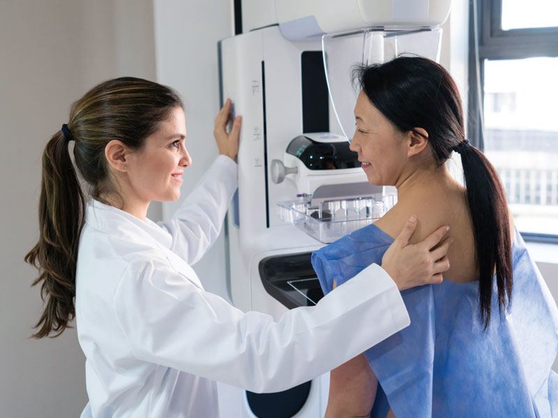 young woman getting a mammogram