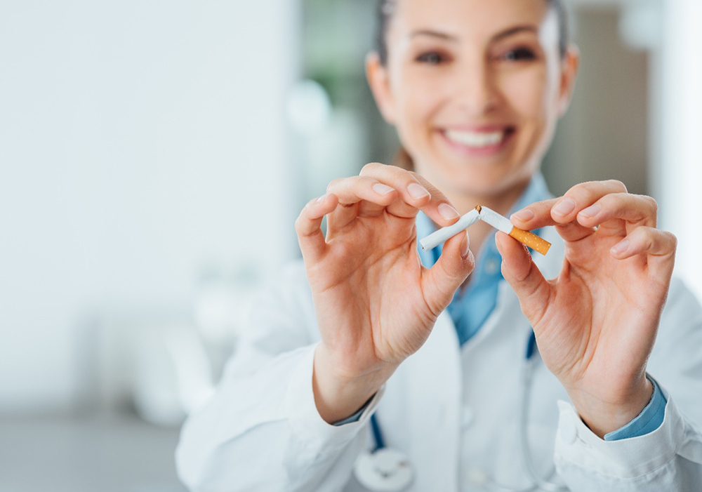 Female healthcare provider breaking a cigarette