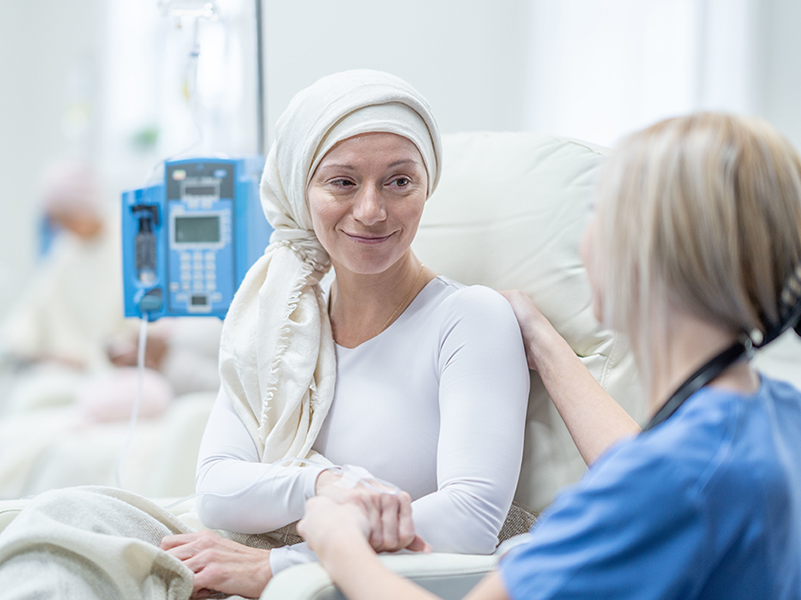 patient looking at nurse with compassion