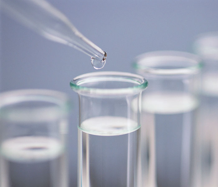 Test tubes filled with a clear liquid