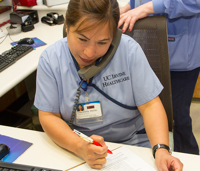 Oncology nurse monitoring oral oncolytics